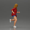 Afraid young woman running in an open shirt and shorts with a determined expression - Only-Games