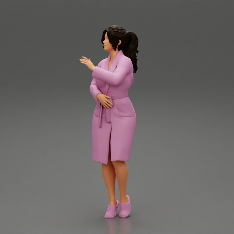 woman in bathrobe standing - Only-Games