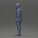 man wearing a hat and hoodie stands confidently watching intently - Only-Games