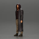 bearded man stands confidently adorned in a stylish hoodie and a flowing long coat - Only-Games