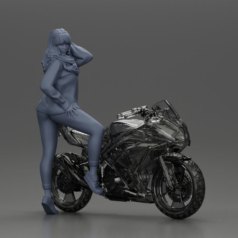 Young woman in  shirt with long hair posing with one foot resting on the motorcycle