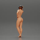 Naked Asian girl in cap standing and thinking - Only-Games