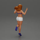happy girl in a bra  and shorts, jumping on one leg - Only-Games
