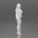 attractive woman posing in an open jacket and mini skirt next to a car with long hair - Only-Games