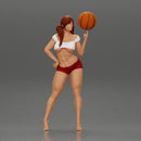 Sexy Young Sporty Girl Playing With the Ball on the Basketball - Only-Games