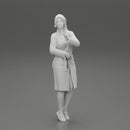 woman in bathrobe standing - Only-Games