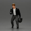 motorbike rider holding a helmet  helping a girl stand up with his hand after she fell off the bike - Only-Games