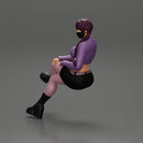 Sexy girl sitting with crossed legs  n boots and mini skirt  with long pigtails - Only-Games