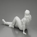 Tired woman mechanic in suit and backwards cap sitting and drinking water during from bottle - Only-Games