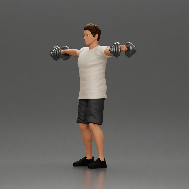 Man in the gym performing shoulder exercises with weights