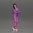 young woman listening to music with headphones and carrying a backpack - Only-Games