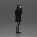 Turkish man in a coat with sweater standing talking on the mobile phone - Only-Games