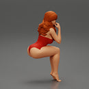 Sexy girl in swimsuit sitting - Only-Games