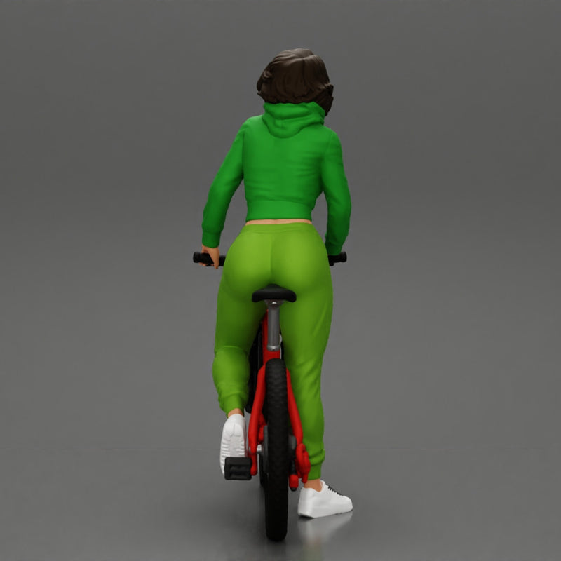 Young sexy sporty woman in pants and snickers short haired posing with bicycle - Only-Games
