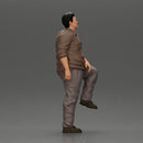 Fat Asian man looking upward in shirt and pants with one leg placed on a step - Only-Games
