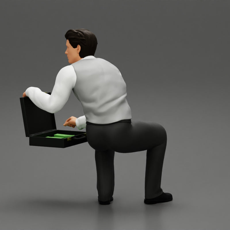 young businessman sitting and holding briefcase of money - Only-Games