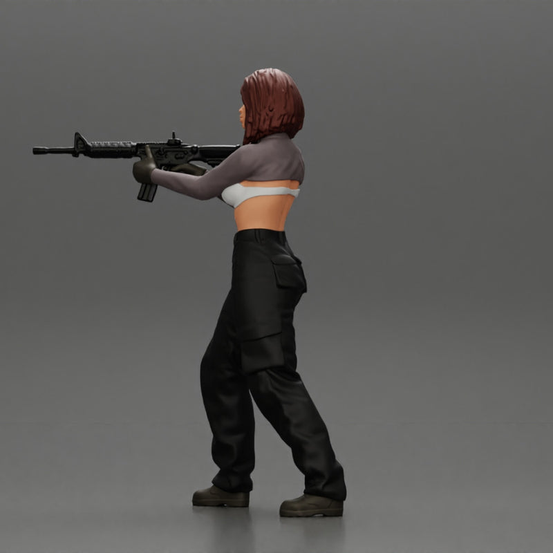 Armed girl going to shoot a gun in a bra with short hair