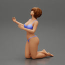 Sexy girl in bikini with short hair sitting on her knees - Only-Games