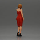 beautiful girl in a mini dress and heels with short hair places her hand on her neck - Only-Games