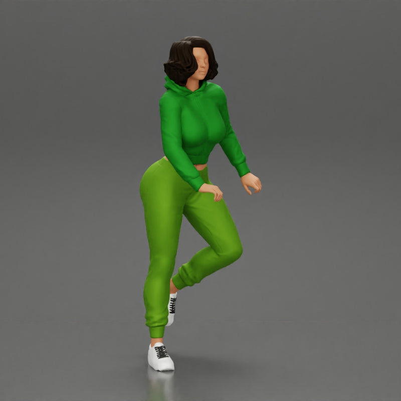 Young sexy sporty woman in pants and snickers short haired posing with bicycle - Only-Games