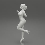 Woman in Mini Dress is Standing on One Leg - Only-Games