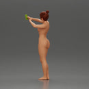 Naked woman taking a selfie with her phone on the beach - Only-Games