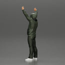 man in a hoodie and scarf is holding a banner - Only-Games