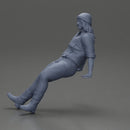 Man in Vintage Outfit and bonnet Seated in a Relaxed Pose - Only-Games