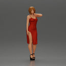 beautiful girl in a mini dress and heels with short hair places her hand on her neck - Only-Games