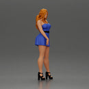 Confident Woman in Blue Dress Posing with Graceful Elegance - Only-Games