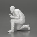 Gangster in hat and jacket sitting and holding a gun hides behind the car - Only-Games