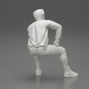 man in leather jacket sitting in thinking pose - Only-Games