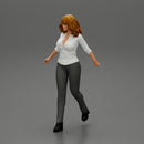 2 Business woman in shirt and trousers pulling suitcase walking in airport terminal - Only-Games