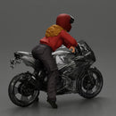 motorcyclist woman in helmet and hoodie sitting on motorcycle - Only-Games