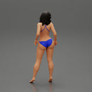 sexy girl in bikini posing standing on the beach - Only-Games