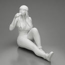 Tired woman mechanic in shirt pants and backwards cap sitting and drinking water during from bottle - Only-Games