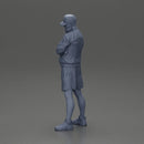 Confident man posing with folded arms, exuding a casual vibe - Only-Games