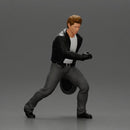 motorbike rider holding a helmet  helping a girl stand up with his hand after she fell off the bike - Only-Games