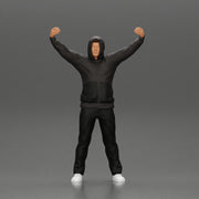 man in a hoodie supporting and holding a scarf - Only-Games