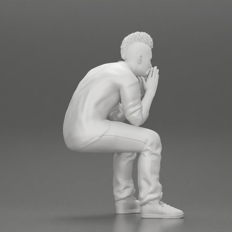 metal man sitting and contemplating with a satanic haircut - Only-Games