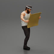 Young Man in hat with beard Holding Map And Looking At it - Only-Games