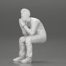 metal man sitting and contemplating with a satanic haircut - Only-Games