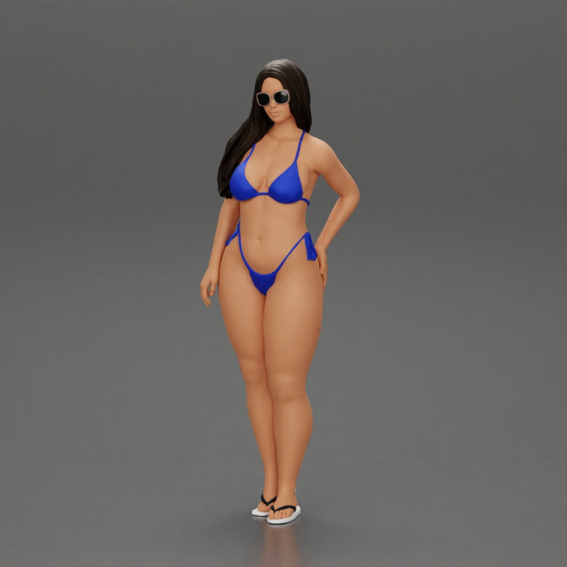 sexy girl in a bikini and sandals with sunglasses  standing putting her left hand on her hip