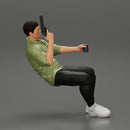 Gangster sitting at the table with a glass of whisky holding gun and playing poker - Only-Games