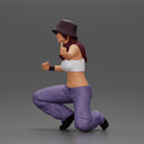 Young girl wearing a hat and pants sitting holding a sign and hitchhiking - Only-Games