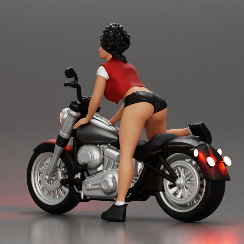 attractive girl on the motorbike in shorts and a mini jacket with curly hair