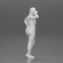 Asian girl in a neck hoodie and cap is standing and thinking - Only-Games