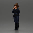 policewoman standing hand resting on her back speaking into a radio - Only-Games