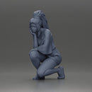 fashionable girl in beachwear is sitting and looking - Only-Games