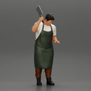 butcher standing while holding a cleaver and cutting something - Only-Games